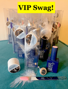 Gel pot with gel polish bottle, feather, Hersehy's chocolate kiss & nail swatch inside clear plastic boxes