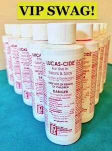 White plastic bottles with dark pink print