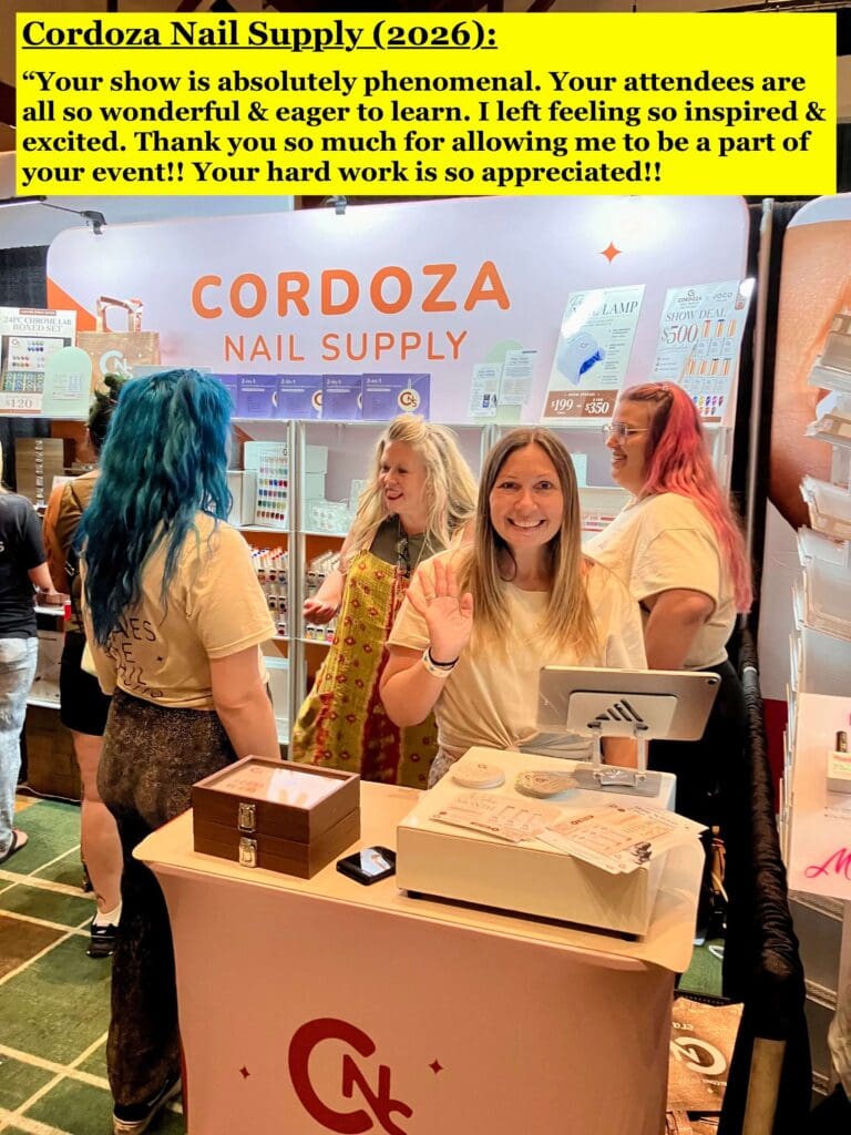 Smiling woman in trade show booth waving